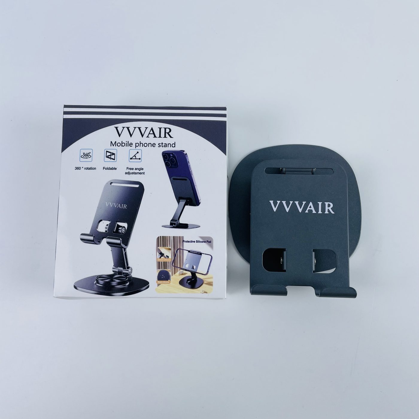 The packaging box facing the camera with the Space Black stand laid flat beside it